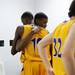 Ypsilanti junior Jaylen Johnson embraces his teammate after losing to Saginaw High on Tuesday, March 19. Daniel Brenner I AnnArbor.com